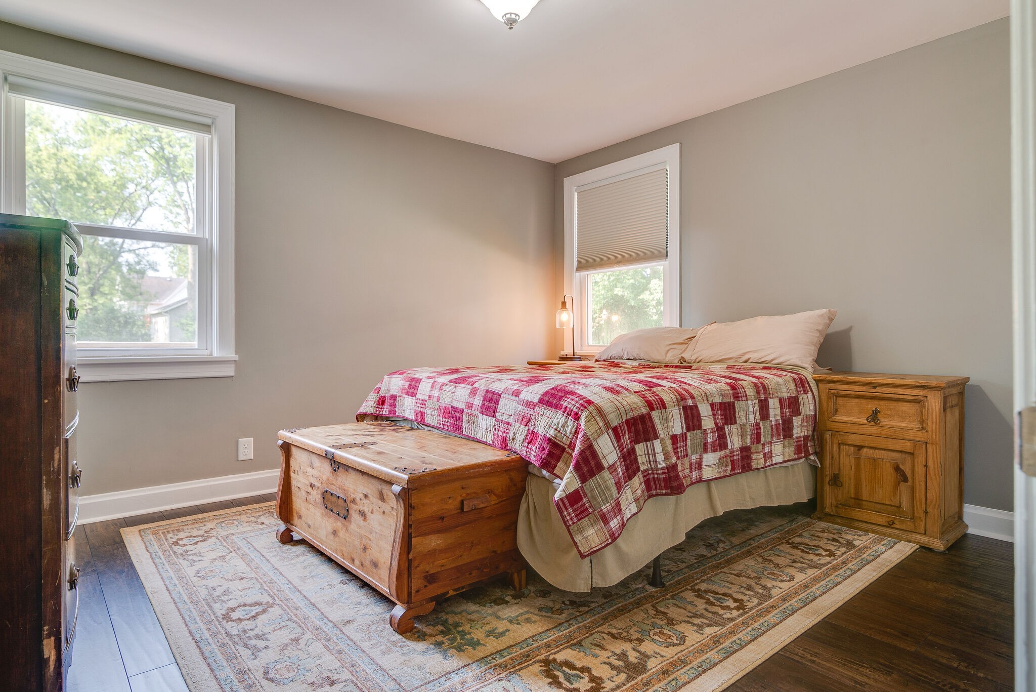 212 Neelys Bend Road Madison, TN 37115 - Photo 13 of 24 a bedroom with a bed and wooden floor