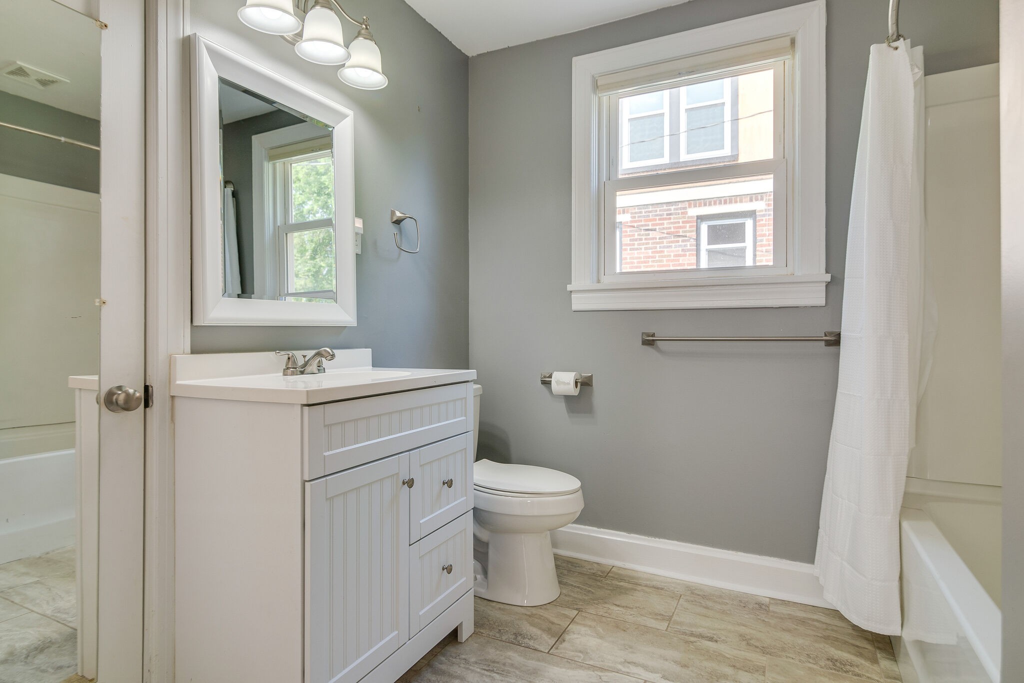 212 Neelys Bend Road Madison, TN 37115 - Photo 15 of 24 a bathroom with a sink toilet and window