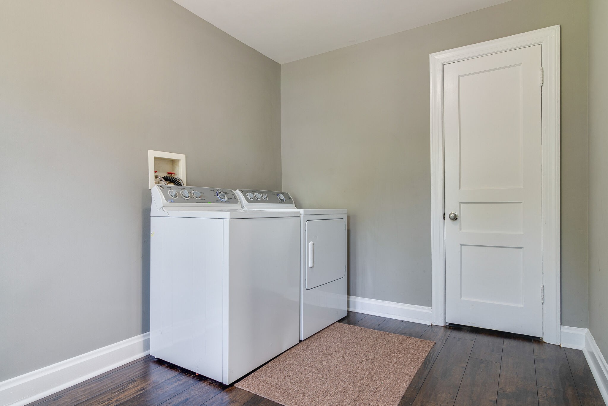 212 Neelys Bend Road Madison, TN 37115 - Photo 16 of 24 a utility room with wooden floor washer and dryer