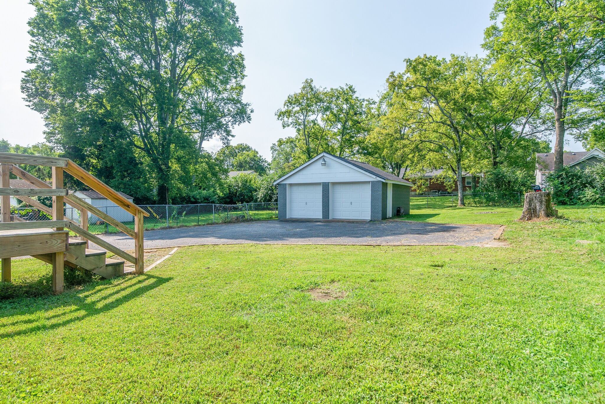 212 Neelys Bend Road Madison, TN 37115 - Photo 22 of 24 a house view with a outdoor space