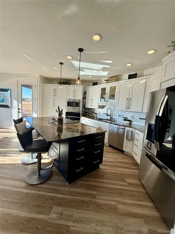 $825,000 | 653 Glenarbor Circle, Longmont, CO 80504