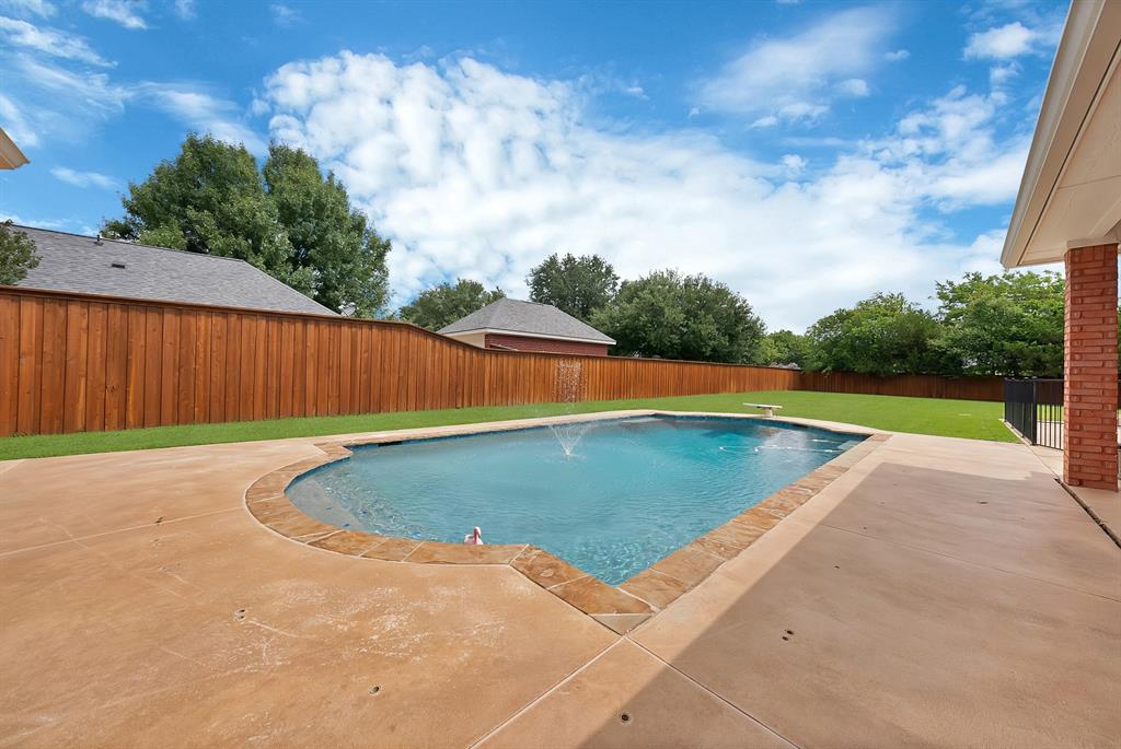 1110 McCampbell Road Mansfield, TX 76063 - Photo 38 of 39 a view of outdoor space yard and swimming pool
