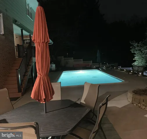 a table and chairs in a patio