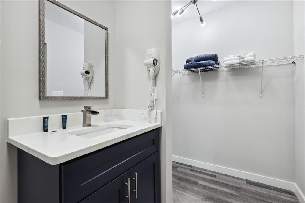 1561 Pontiac Place Southeast Atlanta, GA 30315 - Photo 14 of 14 a bathroom with a sink and a mirror