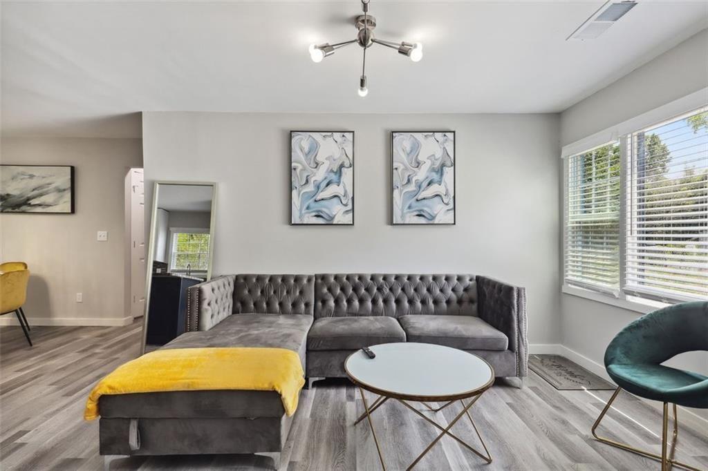 1561 Pontiac Place Southeast Atlanta, GA 30315 - Photo 6 of 14 a living room with furniture and a couch