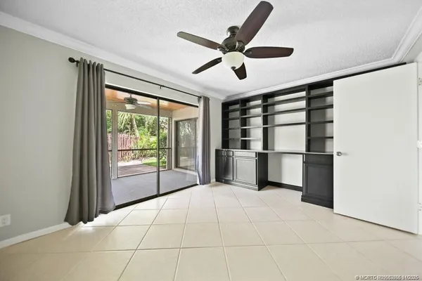 a room with closet and windows