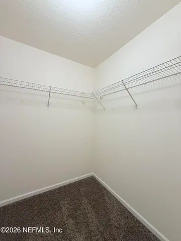a view of small space with racks on the wall