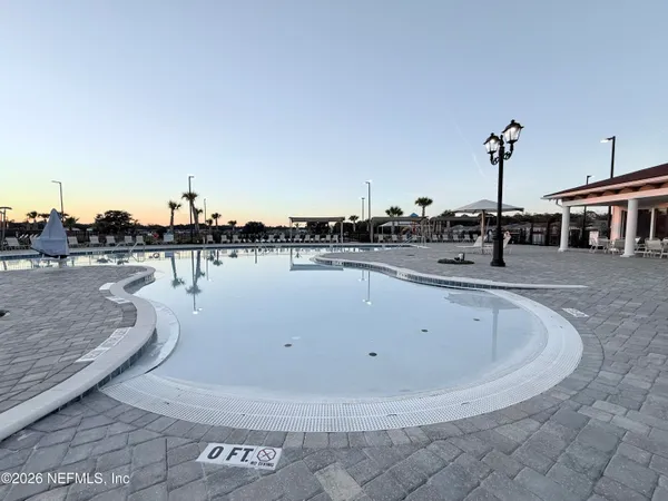 a view of a terrace with sitting area