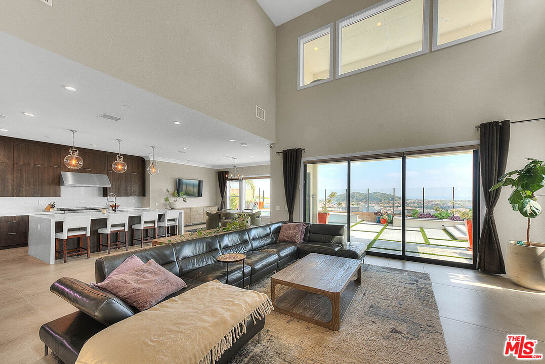 20558 Overlook Court Porter Ranch, CA 91326 - Photo 4 of 48 a living room with furniture and a large window