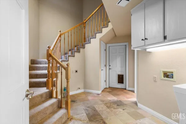 a view of a room that has a window in it