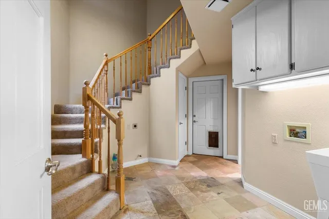 a bathroom with a toilet sink and shower