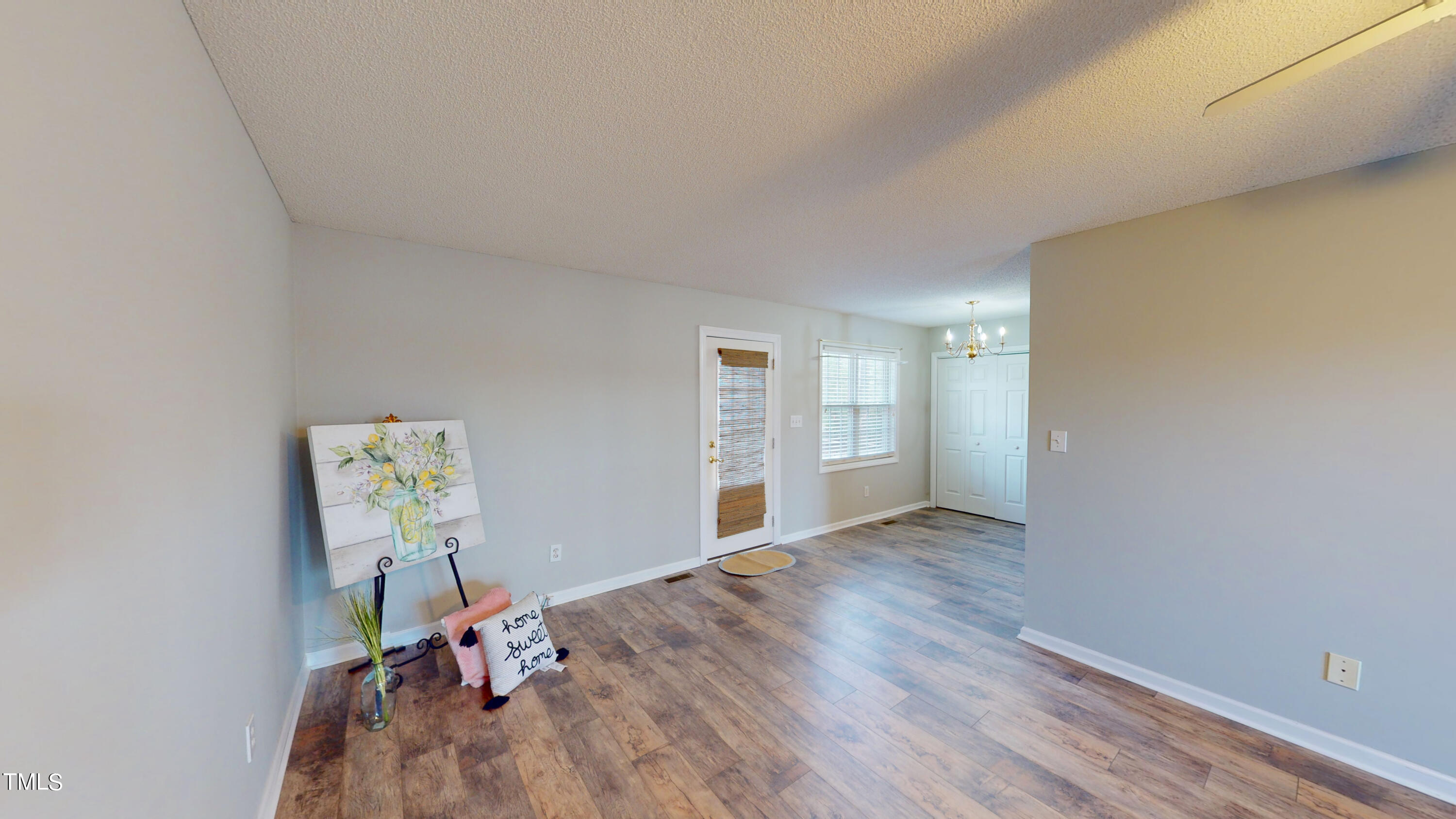 115 Stoneview Circle Smithfield, NC 27577 - Photo 19 of 35 a view of empty room with wooden floor