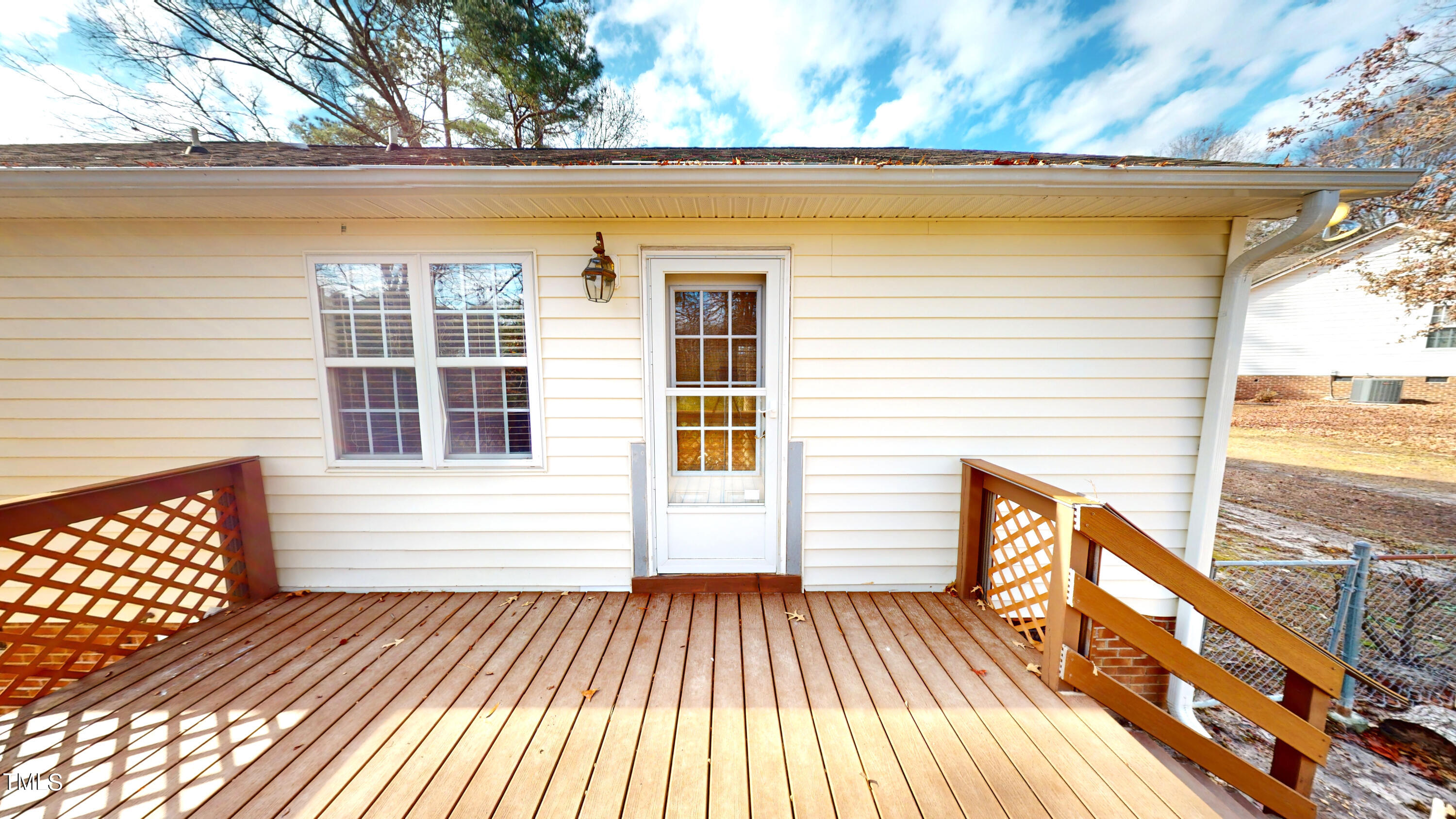 115 Stoneview Circle Smithfield, NC 27577 - Photo 20 of 35 a view of a wooden deck with a yard