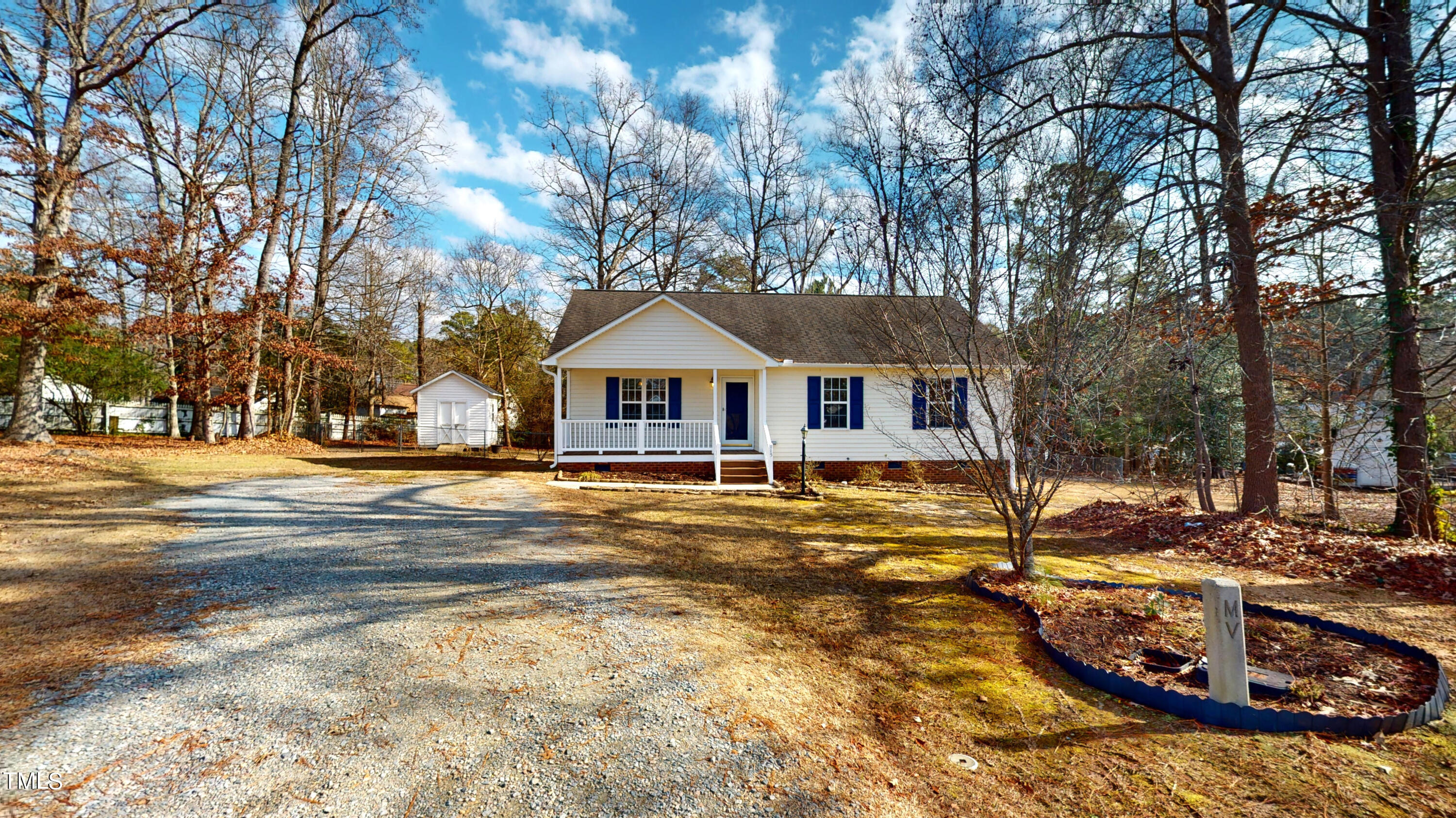 115 Stoneview Circle Smithfield, NC 27577 - Photo 3 of 35 a front view of house with yard and trees around