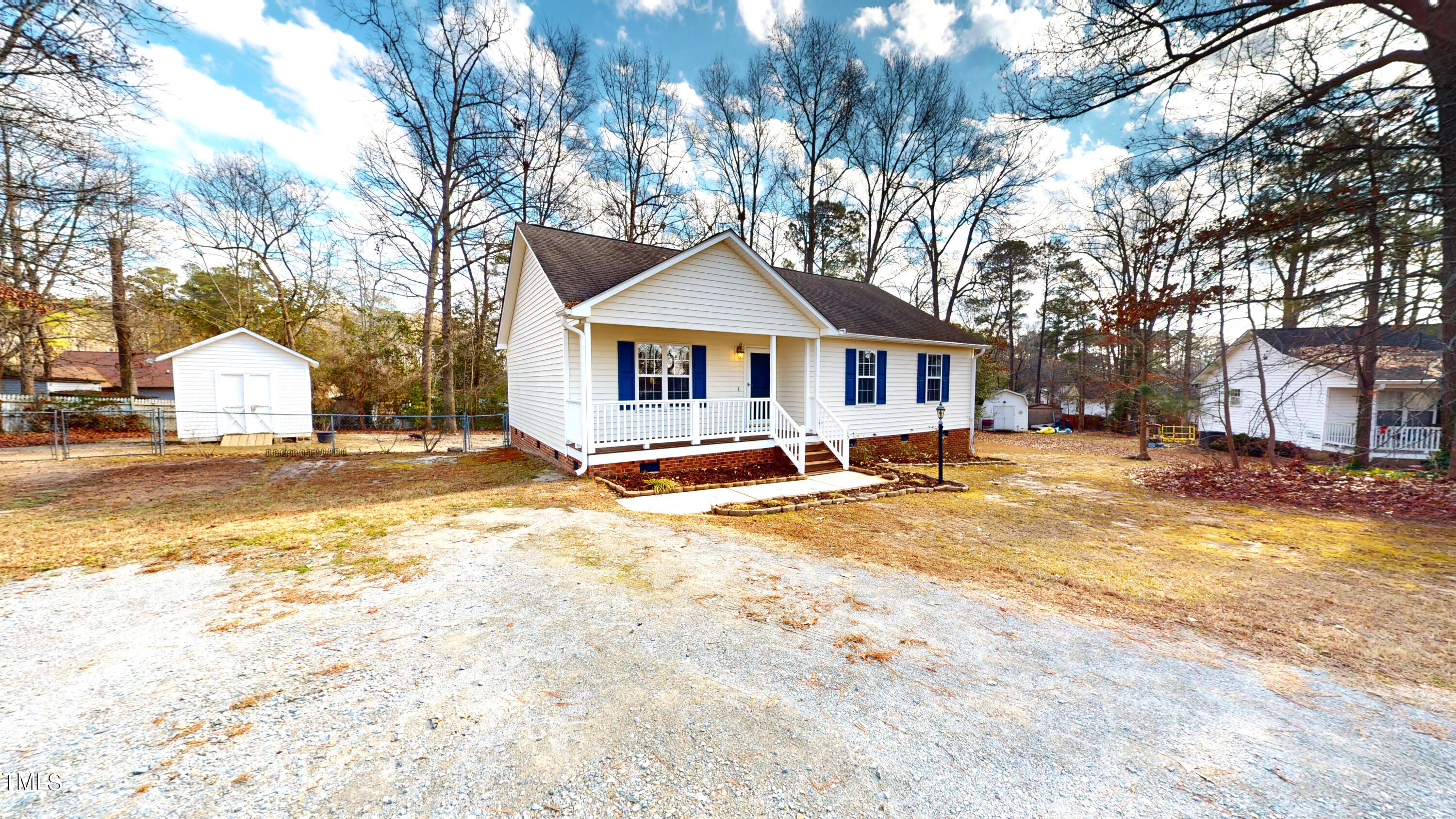 115 Stoneview Circle Smithfield, NC 27577 - Photo 4 of 35 a house with trees in front of it