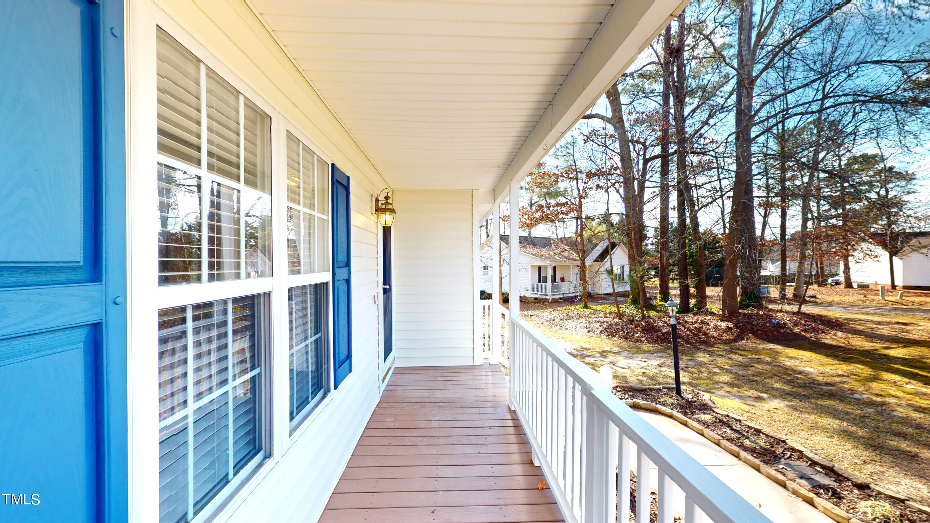 115 Stoneview Circle Smithfield, NC 27577 - Photo 6 of 35 a view of a balcony with wooden floor
