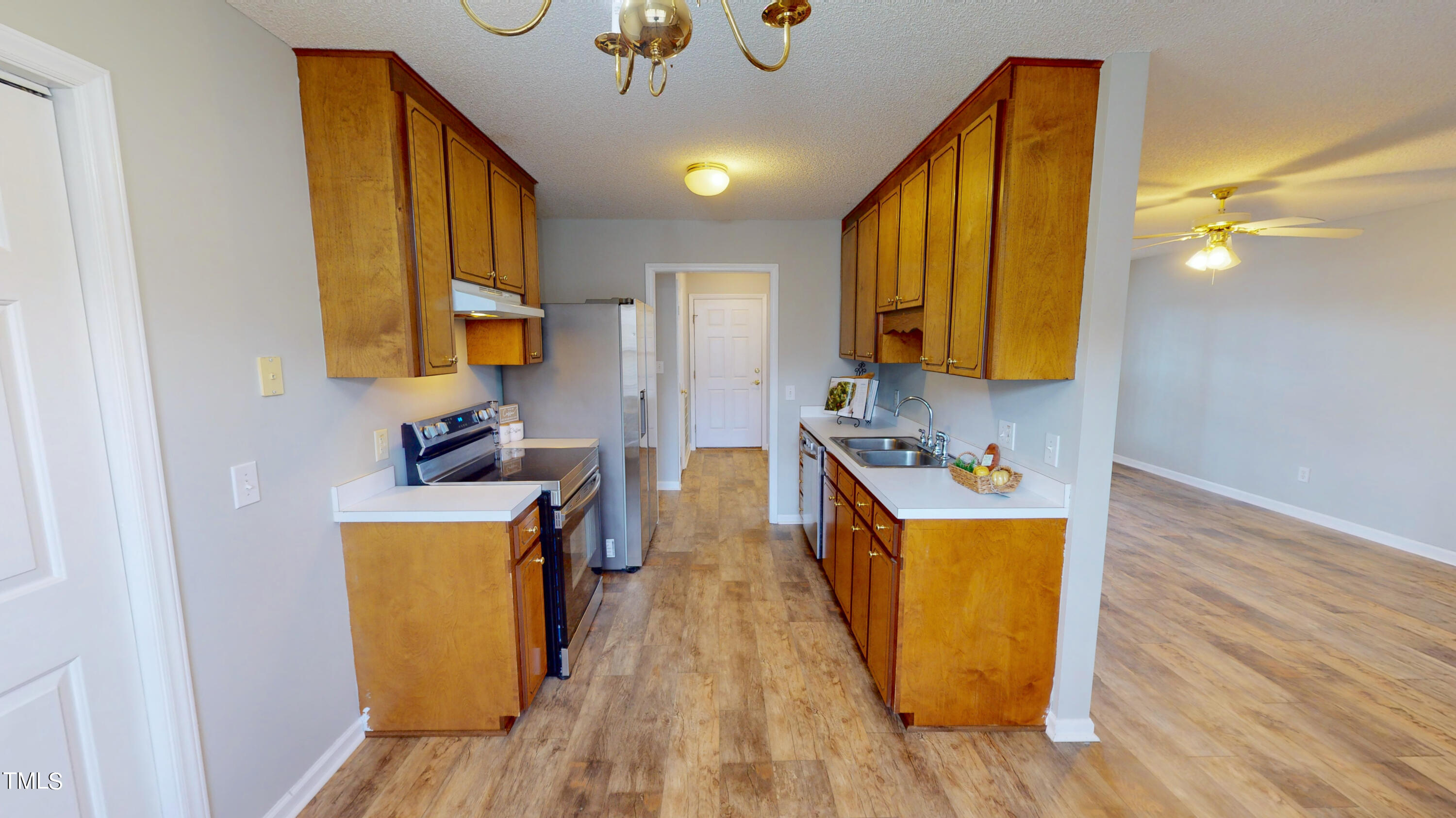 115 Stoneview Circle Smithfield, NC 27577 - Photo 7 of 35 a view of a kitchen with wooden floor