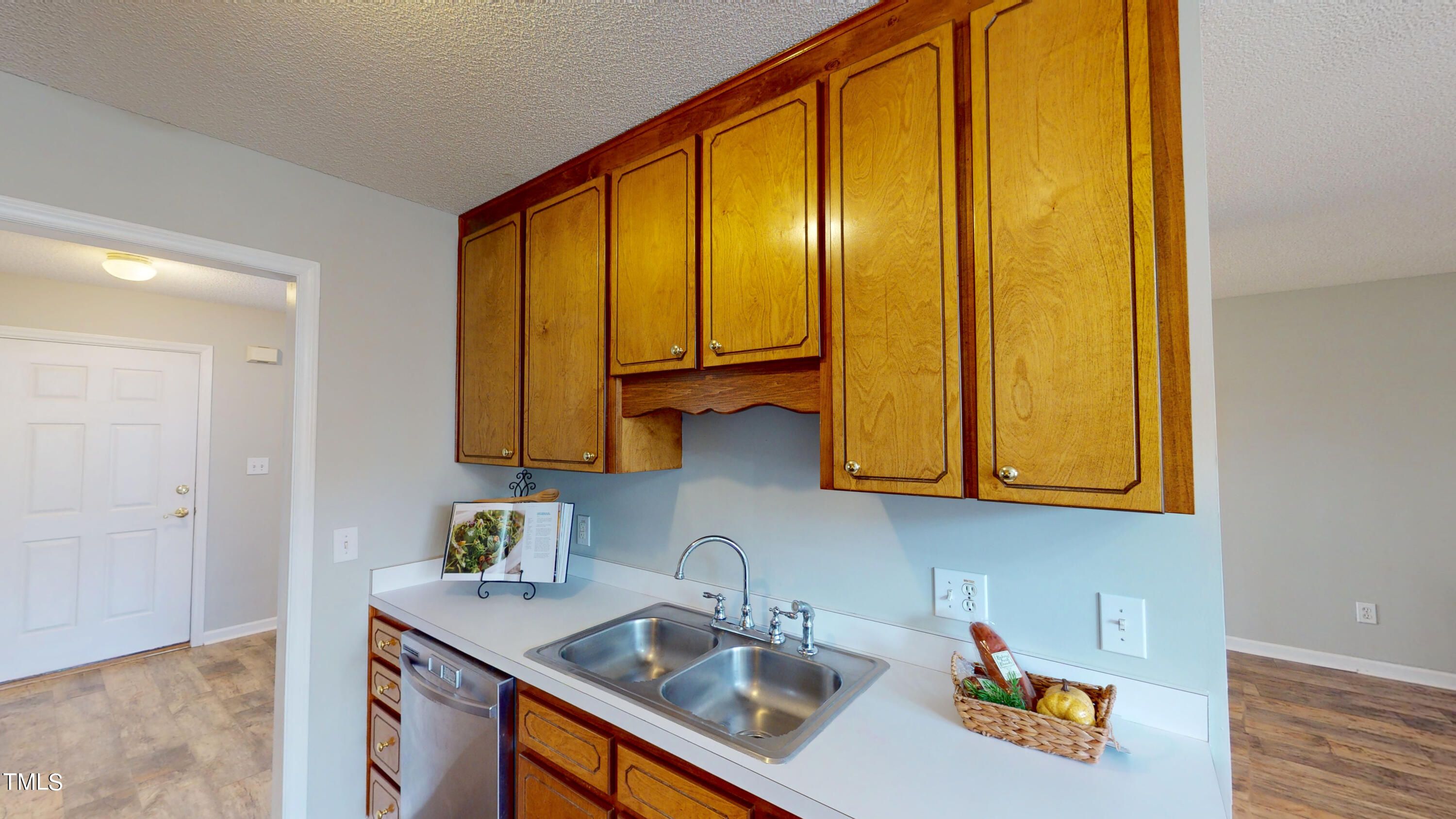 115 Stoneview Circle Smithfield, NC 27577 - Photo 10 of 35 a kitchen with stainless steel appliances granite countertop sink and cabinets