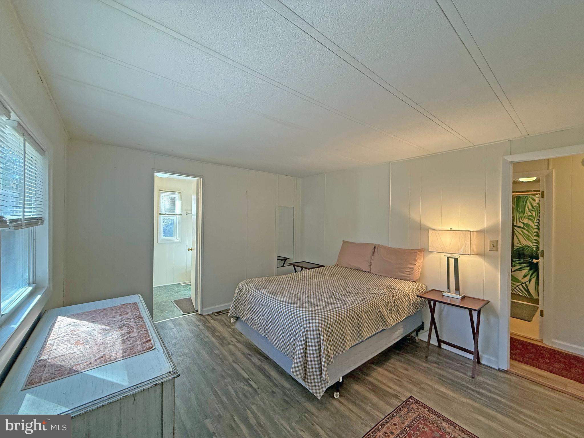 19666 Princess Street, Unit 131 Rehoboth Beach, DE 19971 - Photo 12 of 35 en Suite Main Bedroom