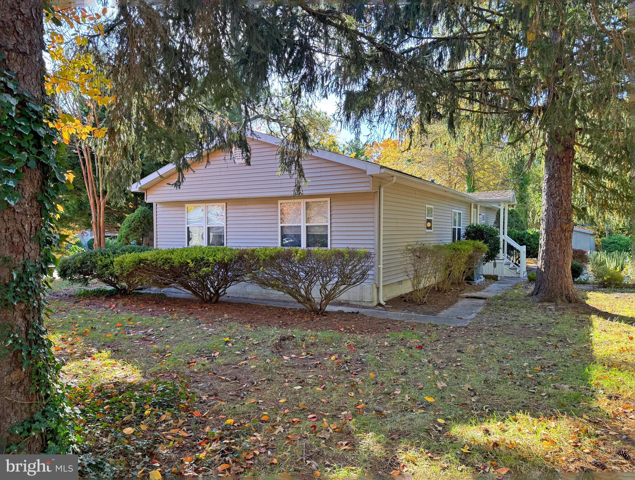 19666 Princess Street, Unit 131 Rehoboth Beach, DE 19971 - Photo 26 of 35 Side Yard