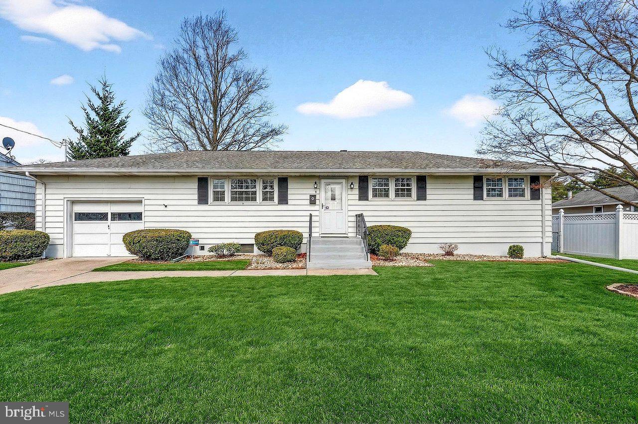 3 Delotto Drive Hamilton, NJ 08619 - Photo 1 of 18 a front view of a house with a yard and garage