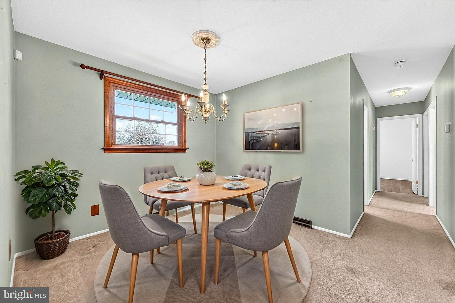3 Delotto Drive Hamilton, NJ 08619 - Photo 7 of 18 a view of a dining room with furniture window and wooden floor