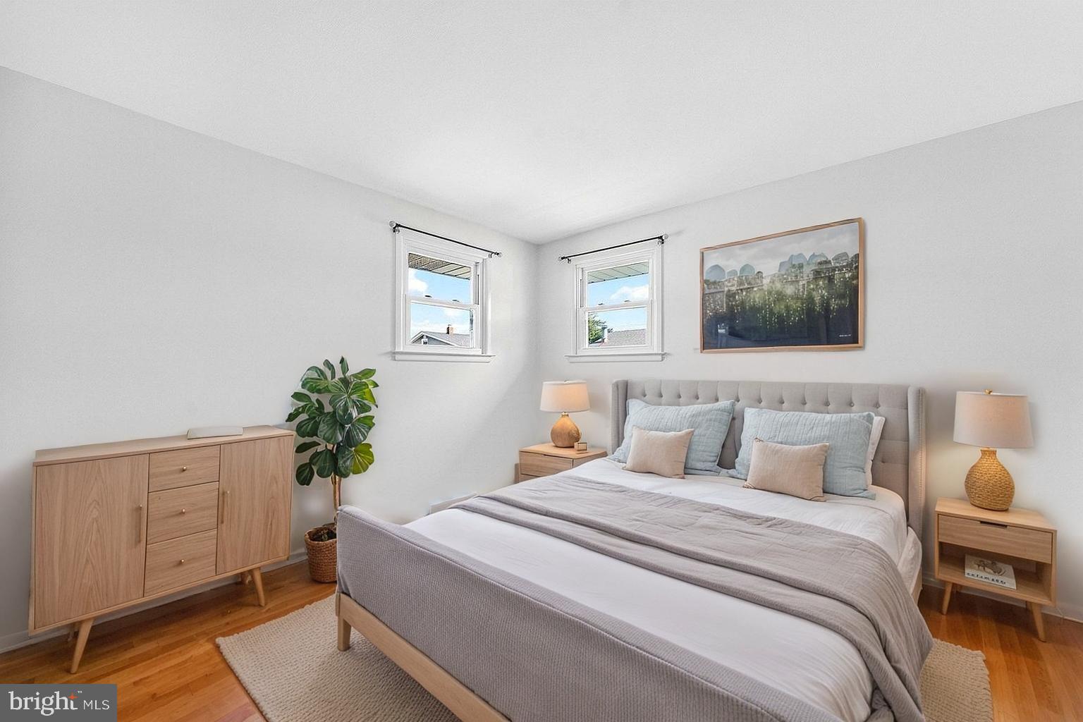 3 Delotto Drive Hamilton, NJ 08619 - Photo 8 of 18 a bedroom with a bed and a potted plant