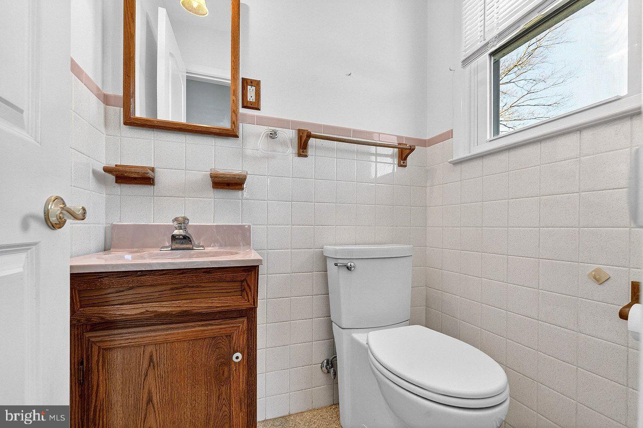 3 Delotto Drive Hamilton, NJ 08619 - Photo 9 of 18 a bathroom with a toilet sink and mirror