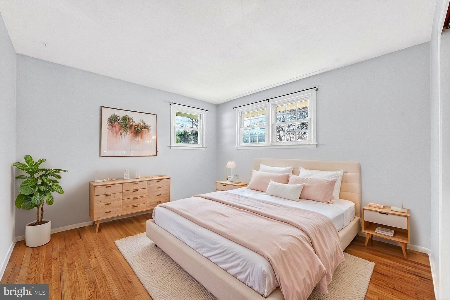 3 Delotto Drive Hamilton, NJ 08619 - Photo 10 of 18 a bedroom with a large bed and a potted plant