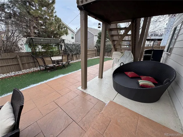 a view of a porch with furniture