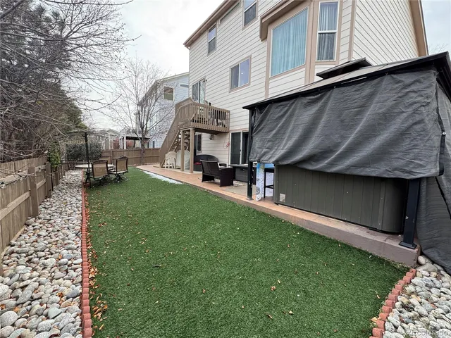 a view of a back yard of the house