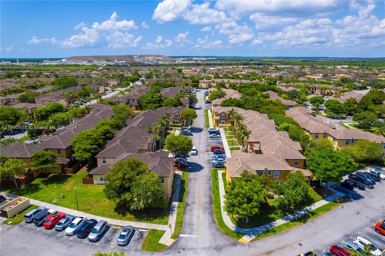 9237 Southwest 227th Street, Unit 6 Cutler Bay, FL 33190 - Photo 33 of 41 an aerial view of residential house with outdoor space