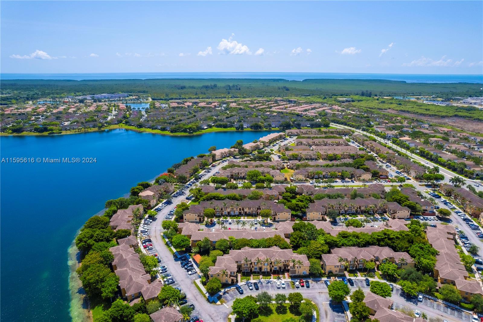 9237 Southwest 227th Street, Unit 6 Cutler Bay, FL 33190 - Photo 41 of 41 a view of city and ocean