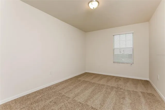 a view of a bathroom with wooden floor