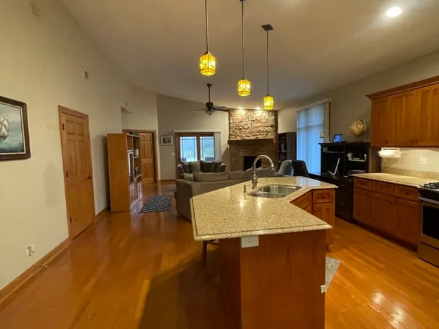 a kitchen with counter top space and stainless steel appliances