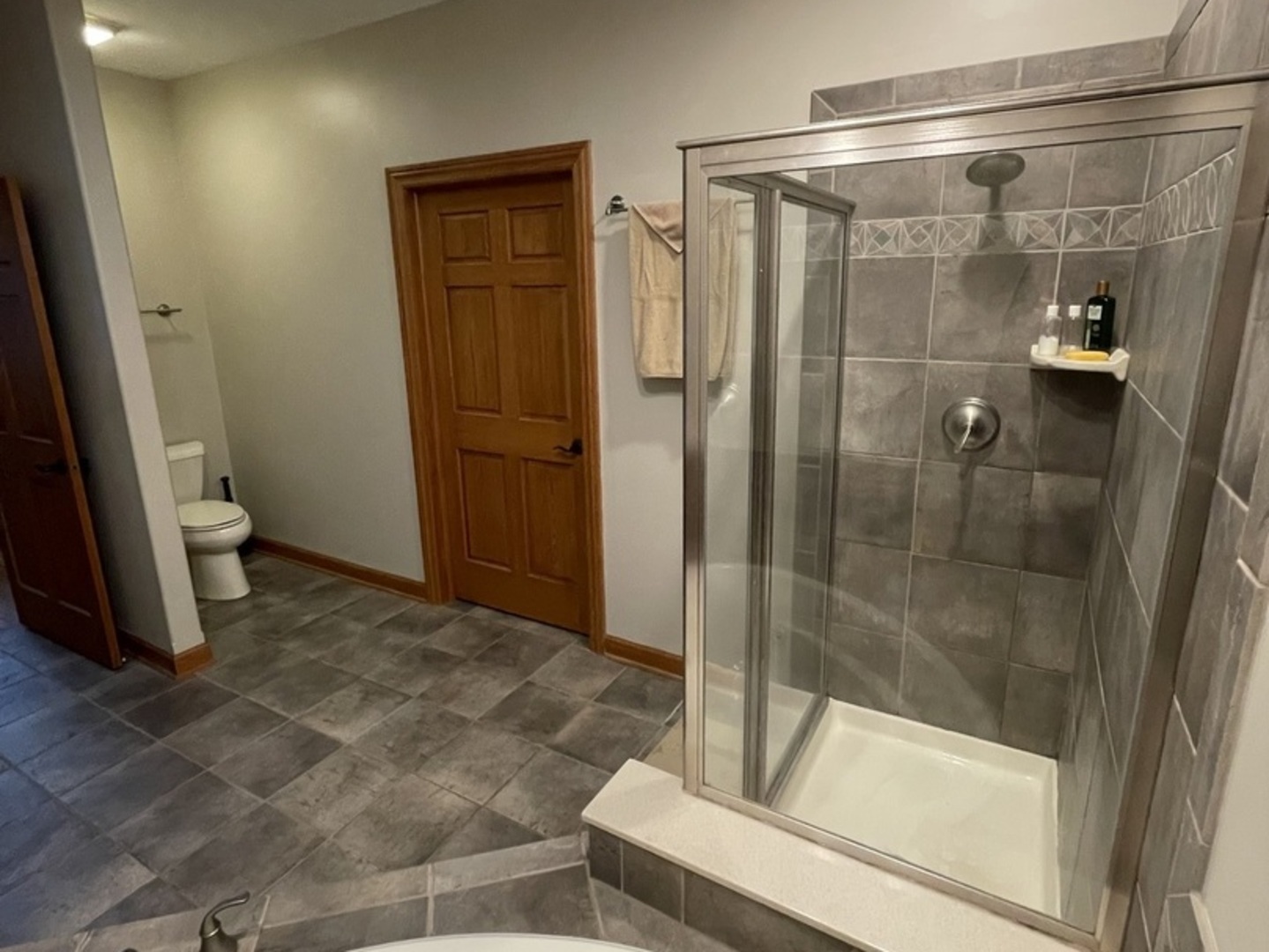 104 River Run Drive St. Anne, IL 60964 - Photo 26 of 31 a bathroom with a glass door shower