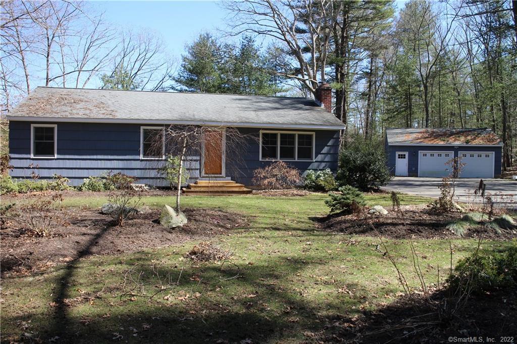 727 Browns Road Mansfield, CT 06268 - Photo 1 of 1 a front view of house with yard and trees in the background