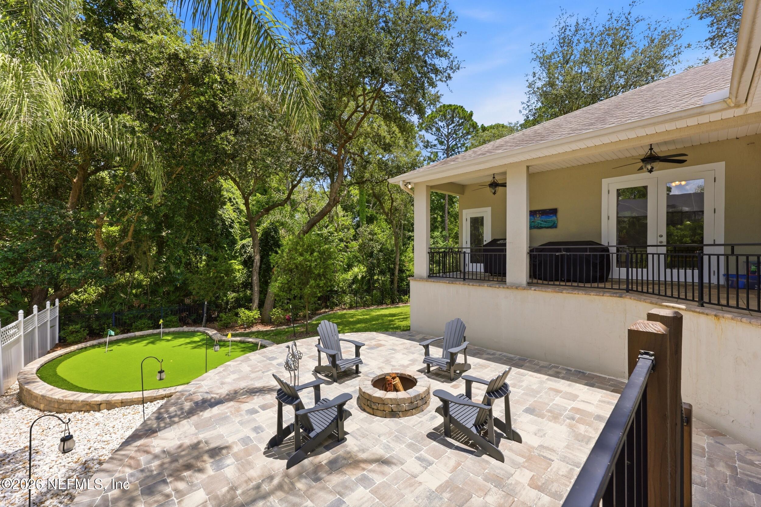 828 Riley Lane St. Augustine, FL 32095 - Photo 46 of 92 049 Lower Patio and firepit
