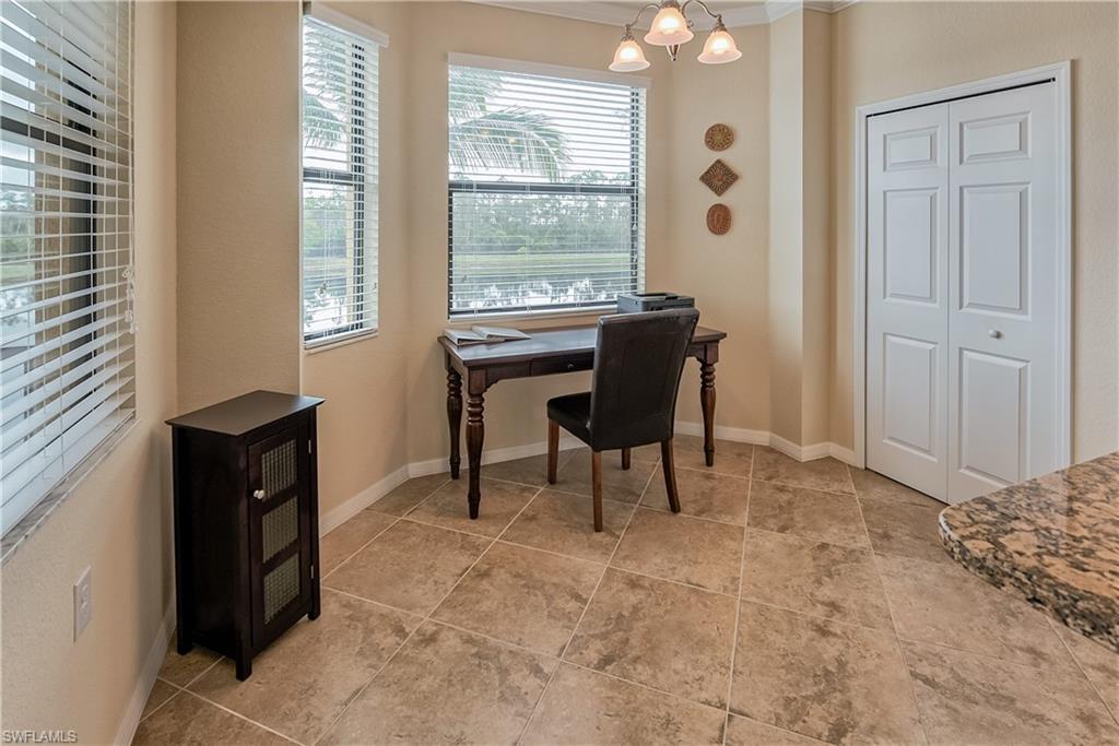 9735 Acqua Court, Unit 622 Naples, FL 34113 - Photo 9 of 34 a view of a workspace with furniture and a window