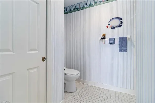 a balcony with furniture and garden view