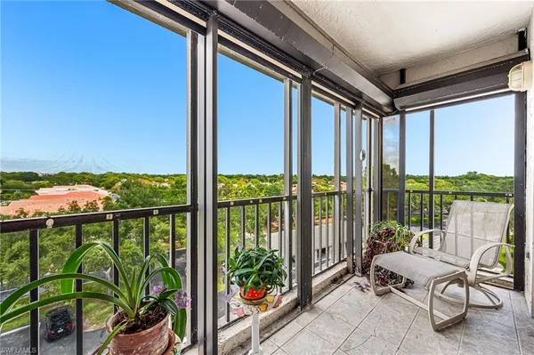 a view of a room with a large window