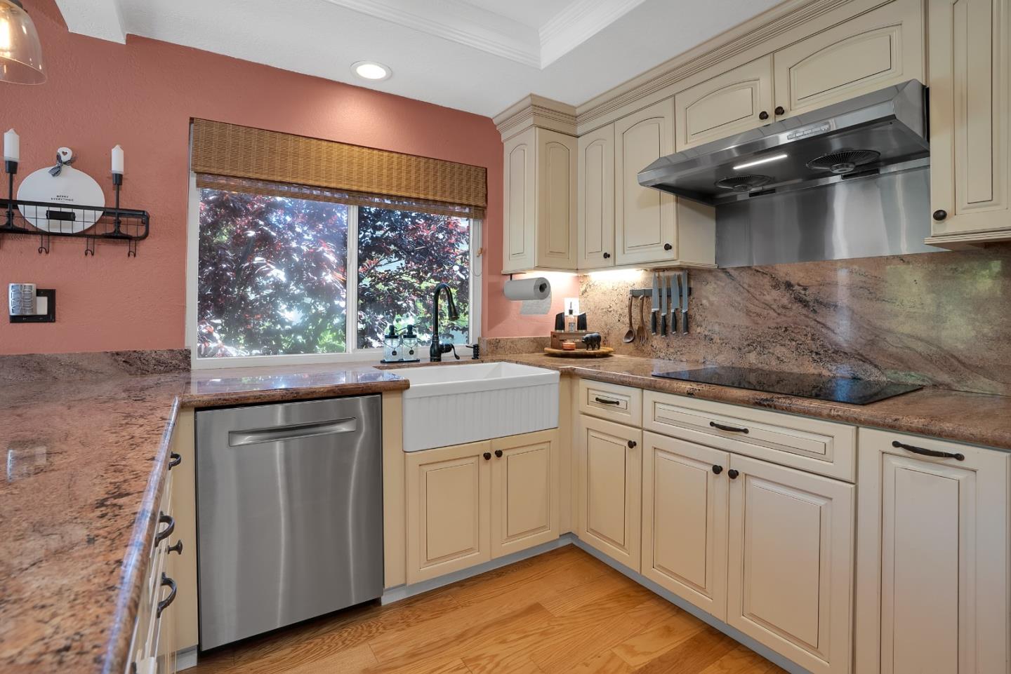 8386 Riesling Way San Jose, CA 95135 - Photo 11 of 45 a kitchen with stainless steel appliances granite countertop a sink and cabinets