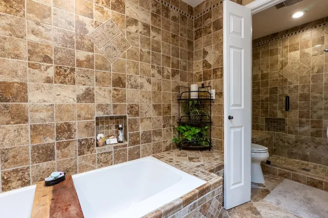 a bath room with a sink and a shower