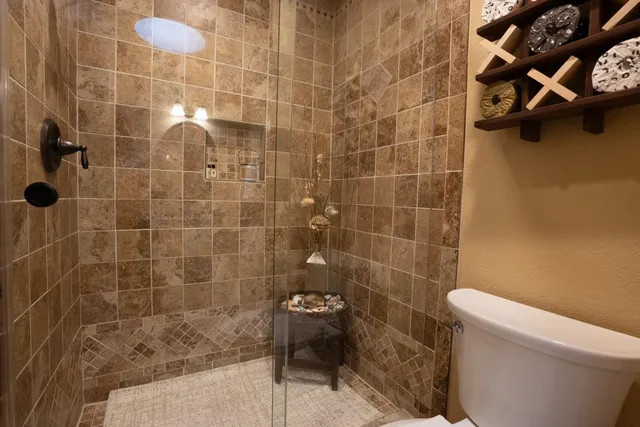 a bathroom with a sink and toilet