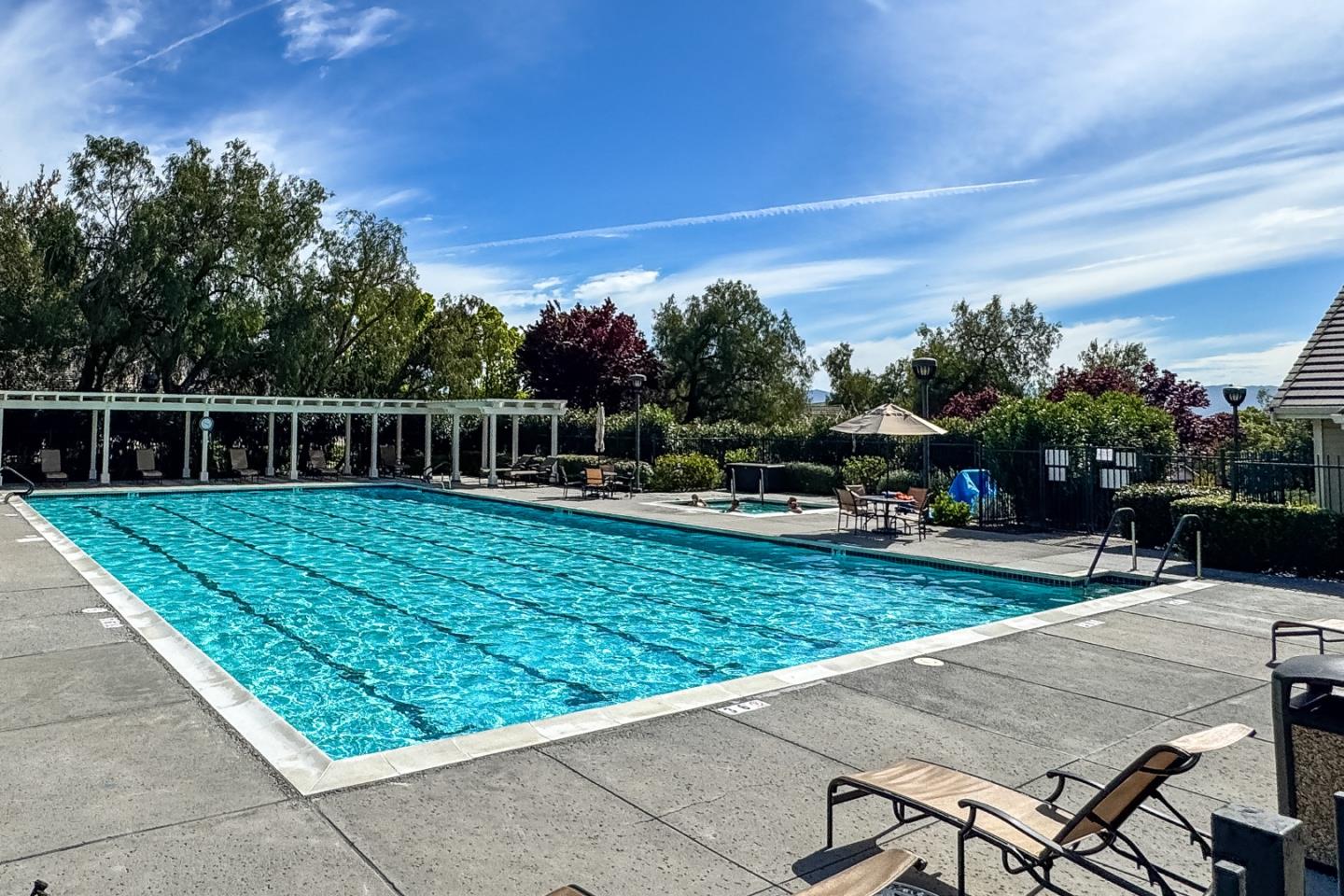 8386 Riesling Way San Jose, CA 95135 - Photo 41 of 45 a view of a swimming pool with a patio
