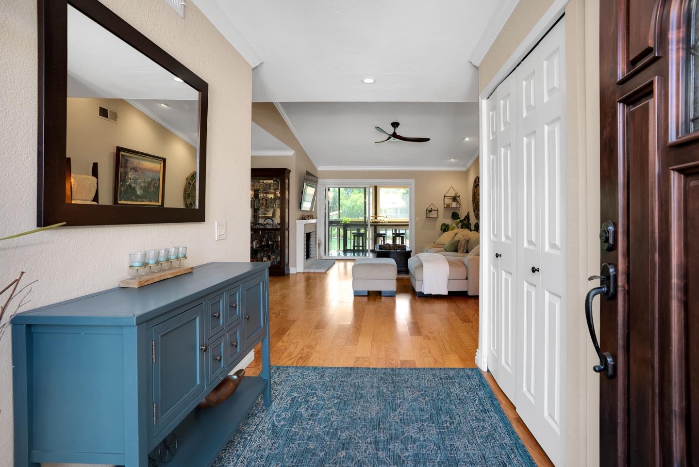 8386 Riesling Way San Jose, CA 95135 - Photo 5 of 45 a hallway with living room and furniture