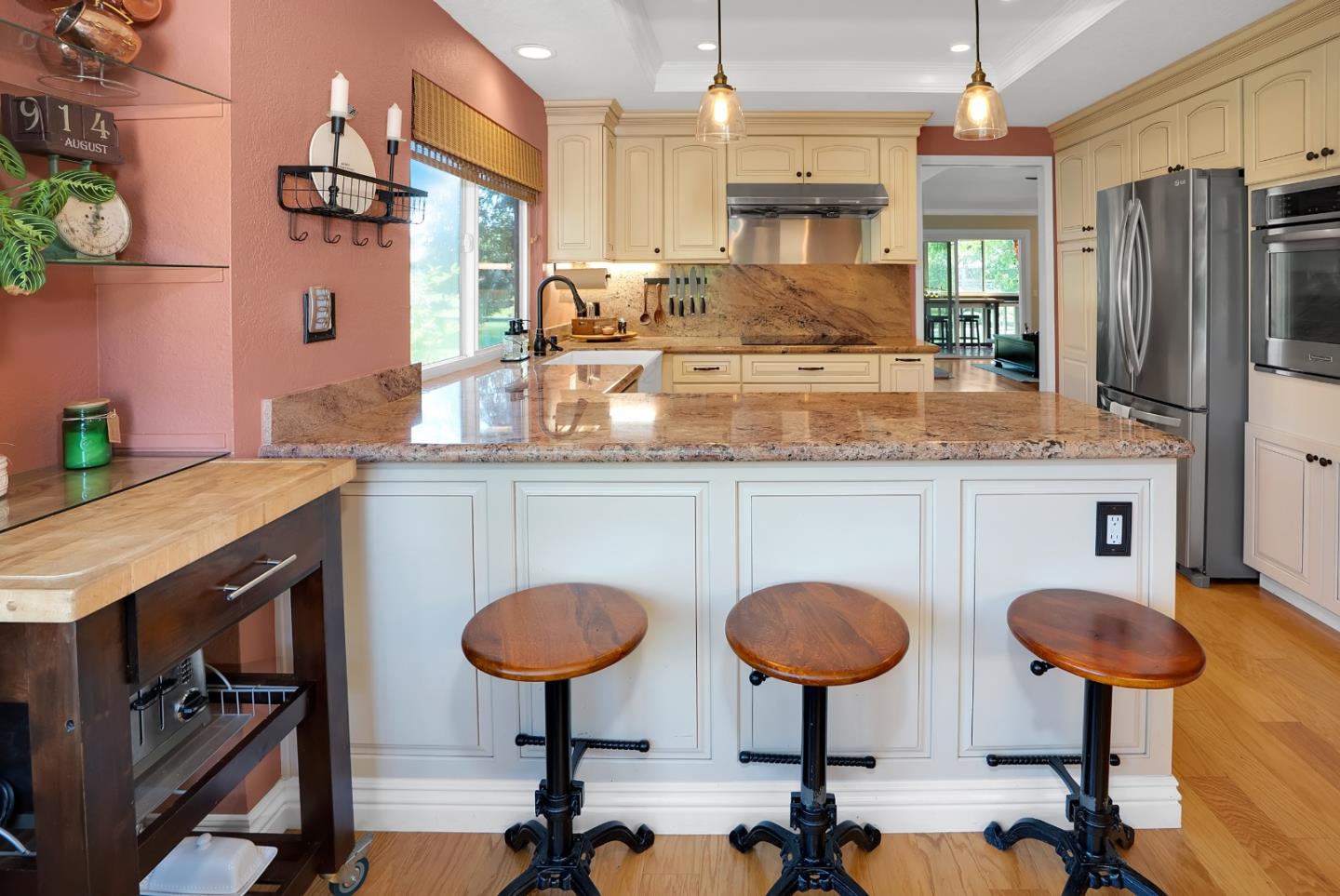 8386 Riesling Way San Jose, CA 95135 - Photo 7 of 45 a kitchen with stainless steel appliances granite countertop a sink and a refrigerator