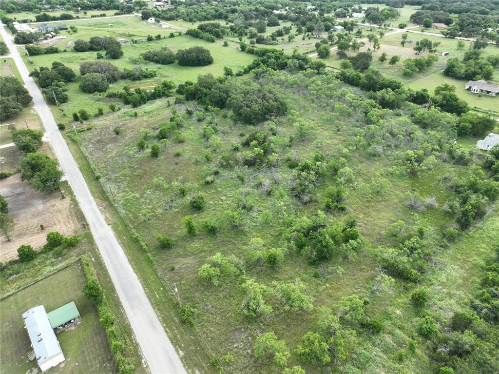 Tbd Tbd Magnolia/ Chestnut Street Hico, TX 76457 - Photo 10 of 11 a view of a lush green forest with large trees
