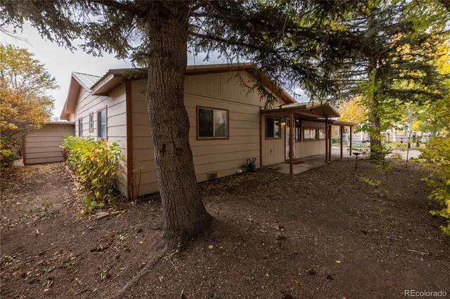 a backyard of a house with lots of green space