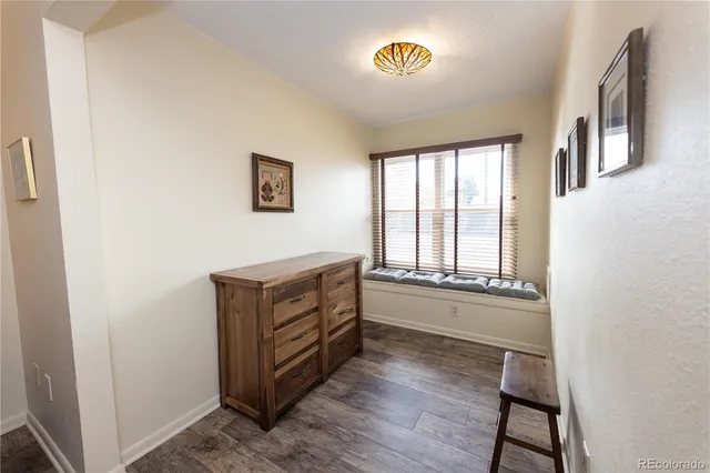 a room with furniture and a window